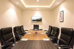 a conference room with a long table and chairs at Best Western Plus Phagwara in Phagwāra +55 photos