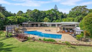 an aerial view of a house with a swimming pool at Glenbrook House and Studio in Ewingsdale