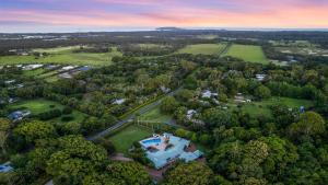 an aerial view of a large house in the woods at Glenbrook House and Studio in Ewingsdale