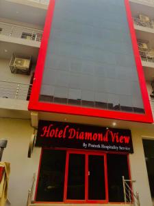 a hotel diamond view sign in front of a building at Hotel Diamond View in Greater Noida