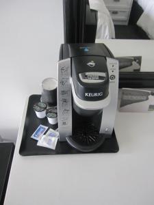 a coffee maker sitting on top of a table at Sole East Beach in Montauk