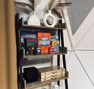 a shelf with snacks on it in a room at CAELO | Peaceful Mountain View Rive in Pililla