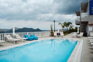 a swimming pool on the roof of a hotel at Archontiko Kiverniti in Pano Lefkara