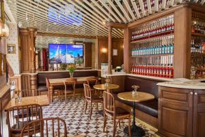 a restaurant with tables and chairs and a bar at Faros Hotel Old City - Special Category in Istanbul