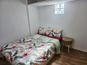 a bedroom with a bed and a small window at MarDeSantaPola in Santa Pola +8 photos