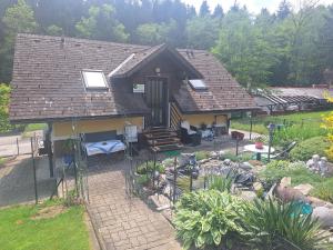 an aerial view of a house with a garden at Ferienhaus Erika in Voitsberg