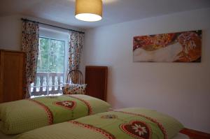 Postel nebo postele na pokoji v ubytování Haus Waldrast