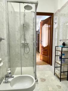 a bathroom with a shower and a sink at Perfect Wave a 10 m dal mare in Sanremo +20 photos