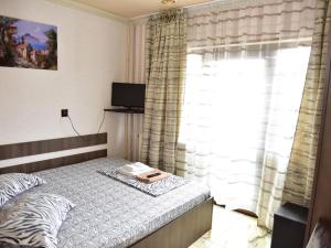 Ένα ή περισσότερα κρεβάτια σε δωμάτιο στο Pensiunea Dely_Cios