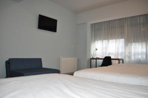 Posteľ alebo postele v izbe v ubytovaní Hotel Celanova