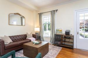 a living room with a couch and a table at The Legacy Inn in Luray