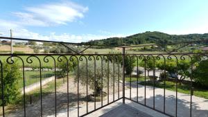 a view of the vineyards from the balcony of a house at Country House Altavilla in Altavilla Silentina