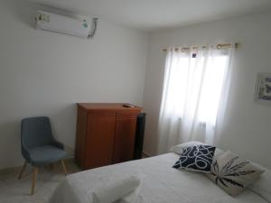 Postel nebo postele na pokoji v ubytování ZOJO MARiNA BAY