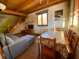 a living room with a couch and a table at Camping Aneto in Benasque