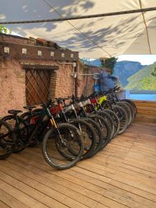 a row of bikes parked next to a building at NATURA rooms&sport in Finale Ligure