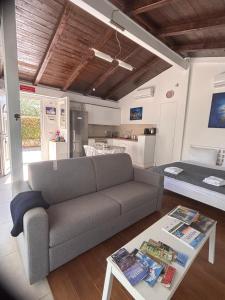a living room with a couch and a table at Matera Villa Mater in Matera