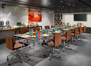 a conference room with a long table and chairs at The G Hotels Istanbul in Istanbul +52 photos