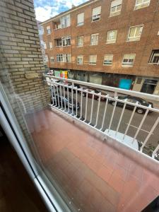a view of a balcony from a building at Pensión el Horno REFORMADO in León