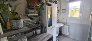 a small bathroom with a sink and a toilet at Maison Acacias Le Mans in Le Mans +20 photos