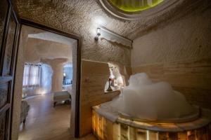 a room with a room with a mirror and a room with a room at Corner İn Cappadocia in Ortahisar +90 photos