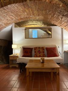 a living room with a couch and a table at Loft con encanto in Cadaqués