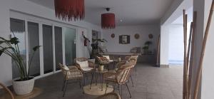 a dining room with a table and chairs at Hotel Teide in El Arenal