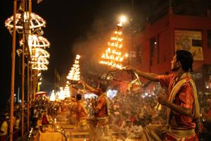 a group of men performing in a parade with lights at Residency Trilok in Varanasi