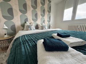 Llit o llits en una habitació de Petit Refuge Dijonnais