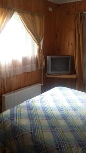 Postel nebo postele na pokoji v ubytování Hostal Costa Azul