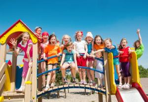 a group of children posing for a picture on a playground at Chalet 4 étoiles - Piscine - ccbg00h in Celles-sur-Plaine