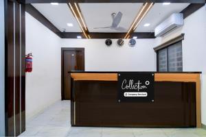 an office with a counter with a sign on it at Super Collection O Park Street Metro Station Formerly Park Platinum in Kolkata