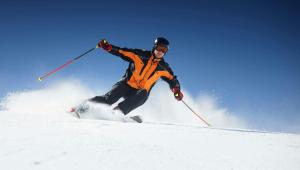 a man is skiing down a snow covered slope at Pleasant Valley Motel West Stockbridge in West Stockbridge