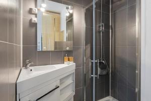 a bathroom with a sink and a shower at Le Clos D'audio in Riols +59 photos