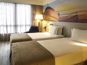 Novotel Florianopolis tesisinde bir odada yatak veya yataklar +126 fotoğraf