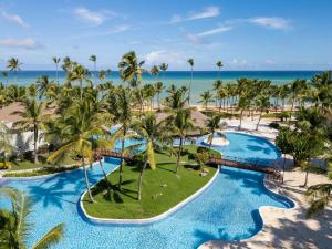 an aerial view of the pool at the excellence punta cana resort at Wyndham Alltra Punta Cana All Inclusive Resort in Punta Cana