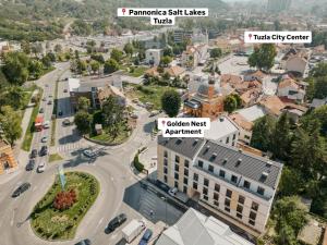 an aerial view of a city with buildings at Golden Nest in Tuzla +8 photos