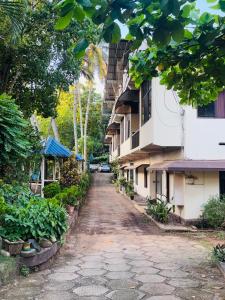 an empty street in front of a building at Panchavadi Beach Resort in Varkala