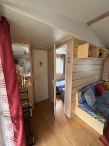 a small room with a bed and a bunk bed at Casa da Agueira AC1 in Pataias +18 photos