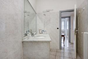 a bathroom with a sink and a shower at Terrazza nel Vigneto - Free parking in Tellaro +26 photos