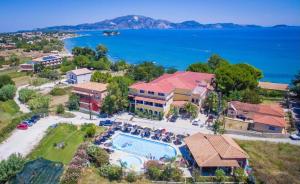 an aerial view of a house with a swimming pool at Porto Koukla Beach in Lithakia