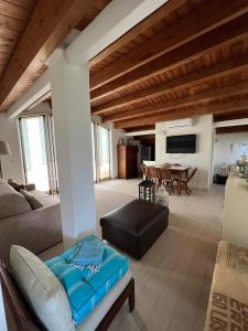 a living room with a couch and a table at I tre platani in Marina di Massa