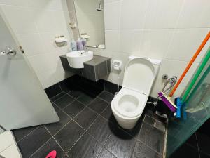 a bathroom with a toilet and a sink at Evo studio soho mini apartment in Bandar Baru Bangi +18 photos