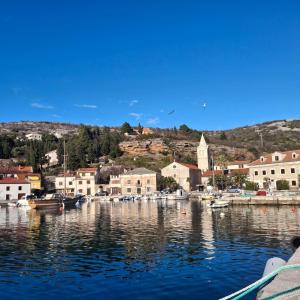 a view of a harbor with boats in the water at Apartman Jure in Jablanac