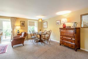 a living room with a table and chairs and a dining room at 3 Bed in Coldstream oc-c39085 in Coldstream