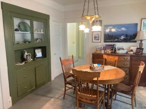 a kitchen with a table and a dining room at Mt Shasta Basecamp in Dunsmuir