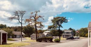 a street in a residential neighborhood with houses at The Chatham Motel in Chatham
