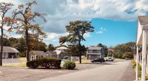 a street in a residential neighborhood with houses at The Chatham Motel in Chatham
