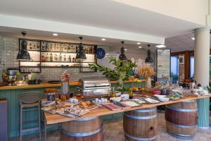 a kitchen with a table with food on it at WEST HOUSE EXCLUSIVE HOTEL in Göcek