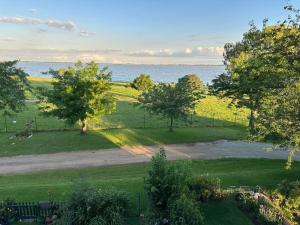 an aerial view of a park with trees and the water at Retro at The Vaal - entire Flat in Denysville