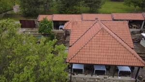 an overhead view of a house with red roofs at Kompleks Gurman in Pʼklište